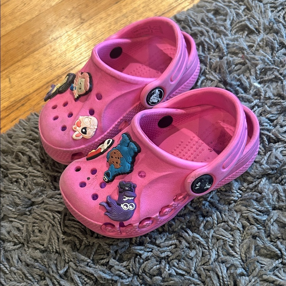 CROCS Kids Pink Shoes with Character Charms Size 6